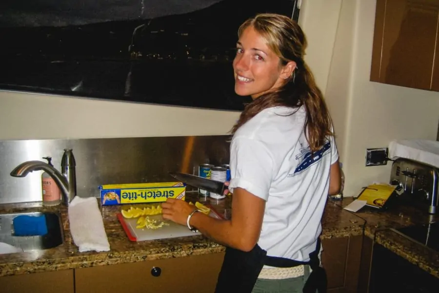 Katie cooking on a yacht